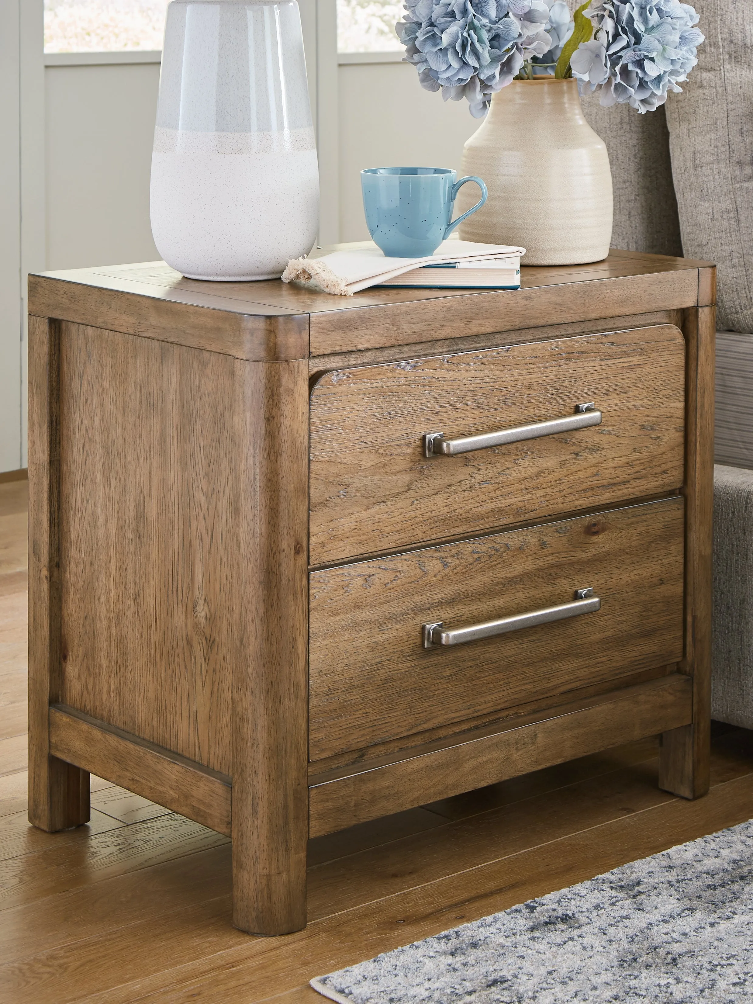 Cabalynn California King Panel Bed with Dresser, Chest and Nightstand in Light Brown