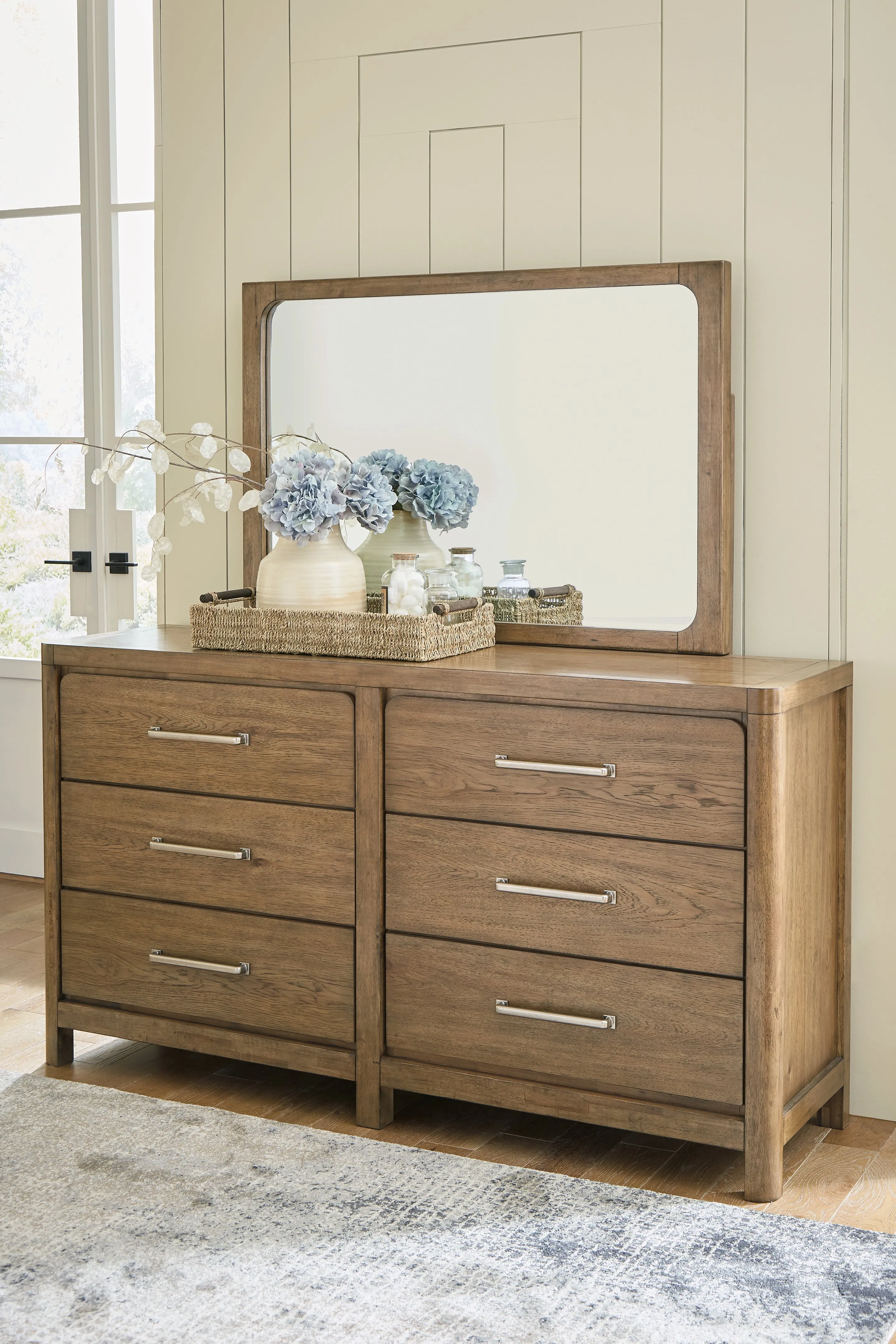 Cabalynn King Panel Bed with Storage with Mirrored Dresser and Chest in Light Brown